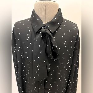 Beautiful flowing star patterned tie-neck blouse